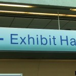 Exhibit hall sign held up with tape from thetapeworks.com